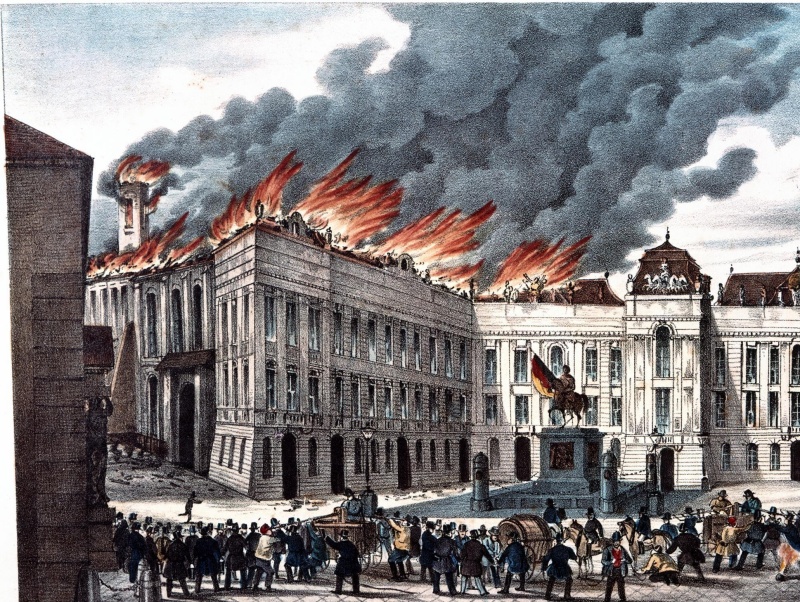 Die Dächer der Hofbibliothek und der angrenzenden Augustinerkirche am Josefsplatz brennen am 31. Okober 1848. Kolorierte Lithografie; im Untertuetel steht: zu haben bei F(ranz) Werner in Wien.