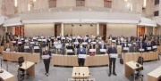 Blick Richtung aller Bundesratsmitglieder mit Tafel: We Remember