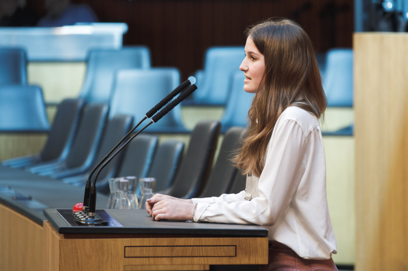 Veranstaltungsteilnehmerin am Renderpult