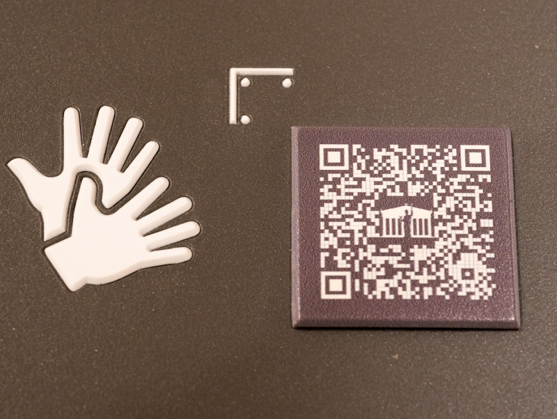 QR codes are used throughout the Parliament Building to retrieve information.