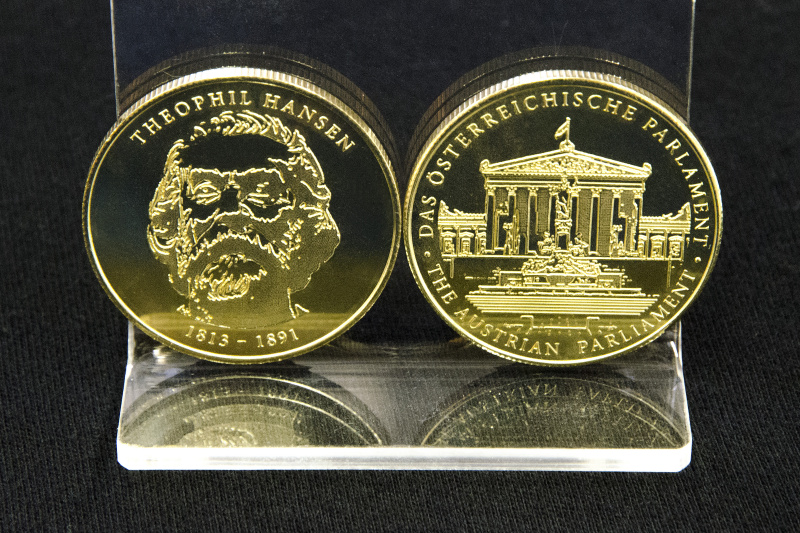 Münze mit dem Erbauer des Parlaments Theophil Hansen
