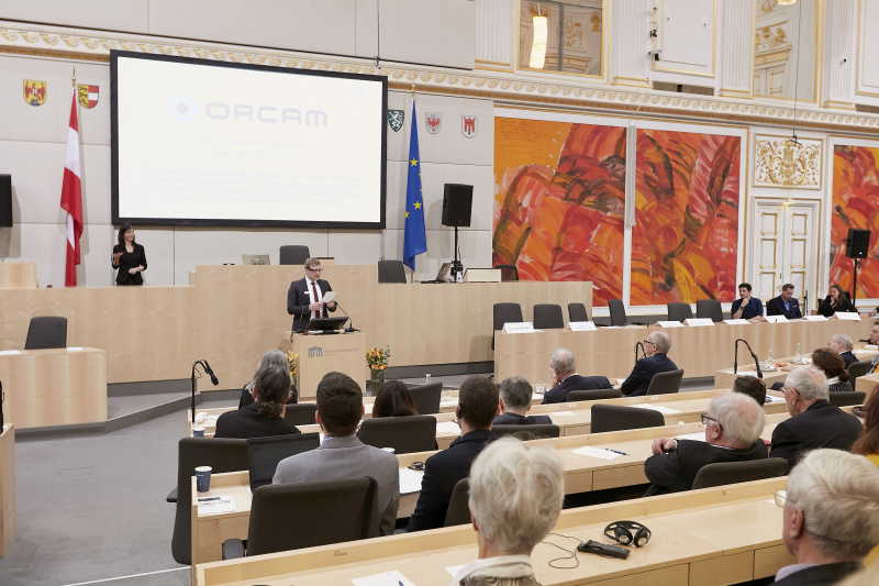 Vorstellung der Initiativen: OrCam. Blick Richtung VeranstaltungsteilnehmerInnen